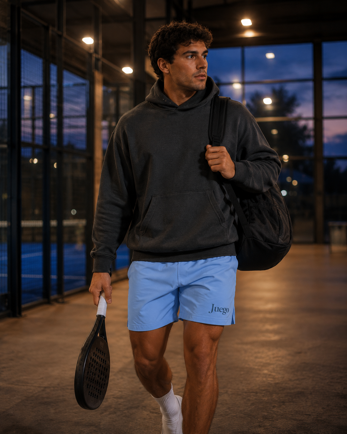 Waffle Hoodie in dark gray, walking off court at dusk
