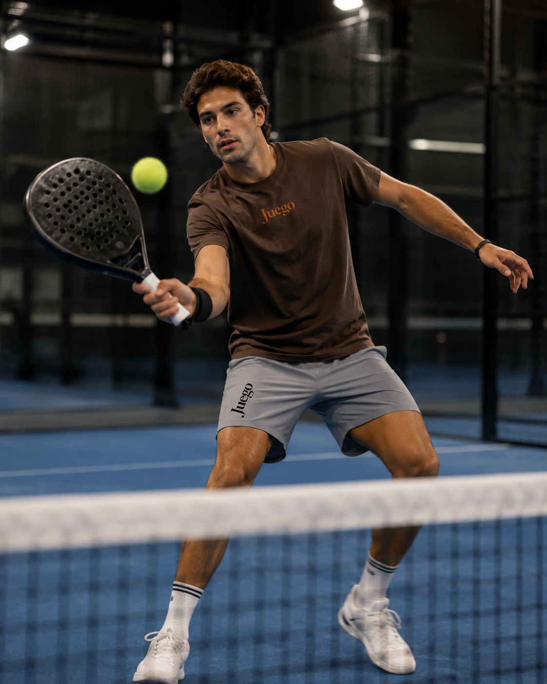 Core Tee in coffee, mid-volley indoors